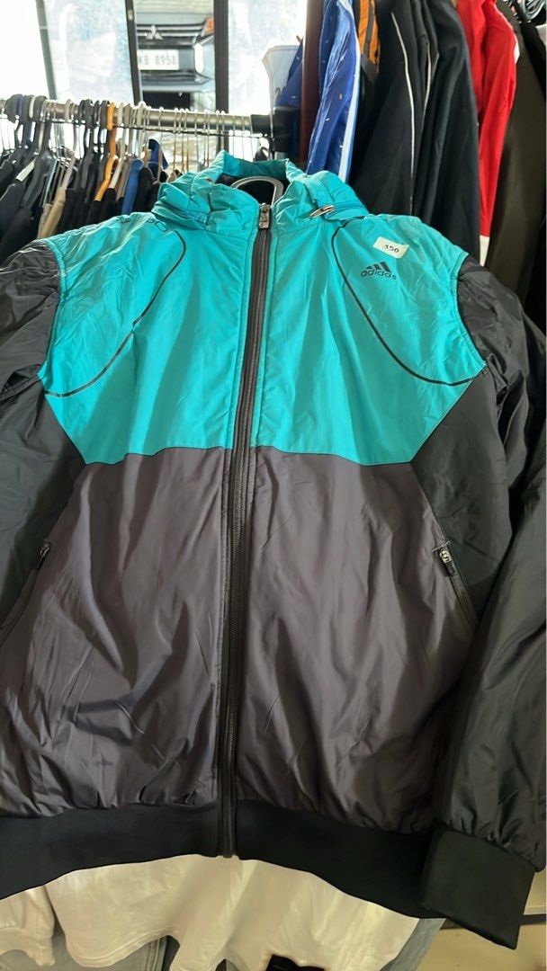Vintage Adidas Puffer jacket (removable hood) (Category: Coats, Jackets and Outerwear) located in Lopez. Submitted by goldenbird-0985 (Listing ID 1469903420, Image 2). Description: Size M-L best fit medium No issue as new condition for a vintage piece.