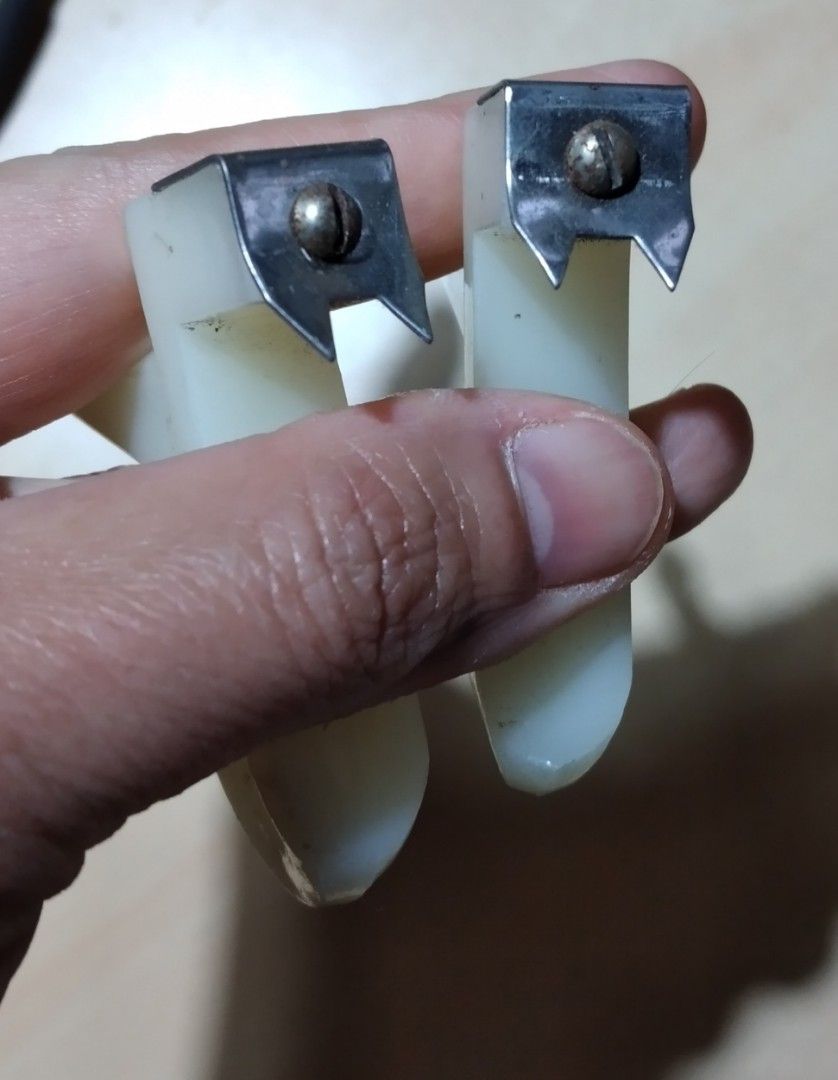 Vintage Adjustable Portable Removable White Plastic Cabinet Hooks (Category: Hooks & Hangers) located in Baguio. Submitted by tipiditis (Listing ID 1469860467, Image 3). Description: - Set of 2 off-white plastic hooks with durable metal mounting brackets - Secure grip on cabinet edges or door frames - Sturdy dual-hook design for extra hanging space - Ideal for towels, aprons, pot holders, and lightweight kitchen tools - Clean condition with minim