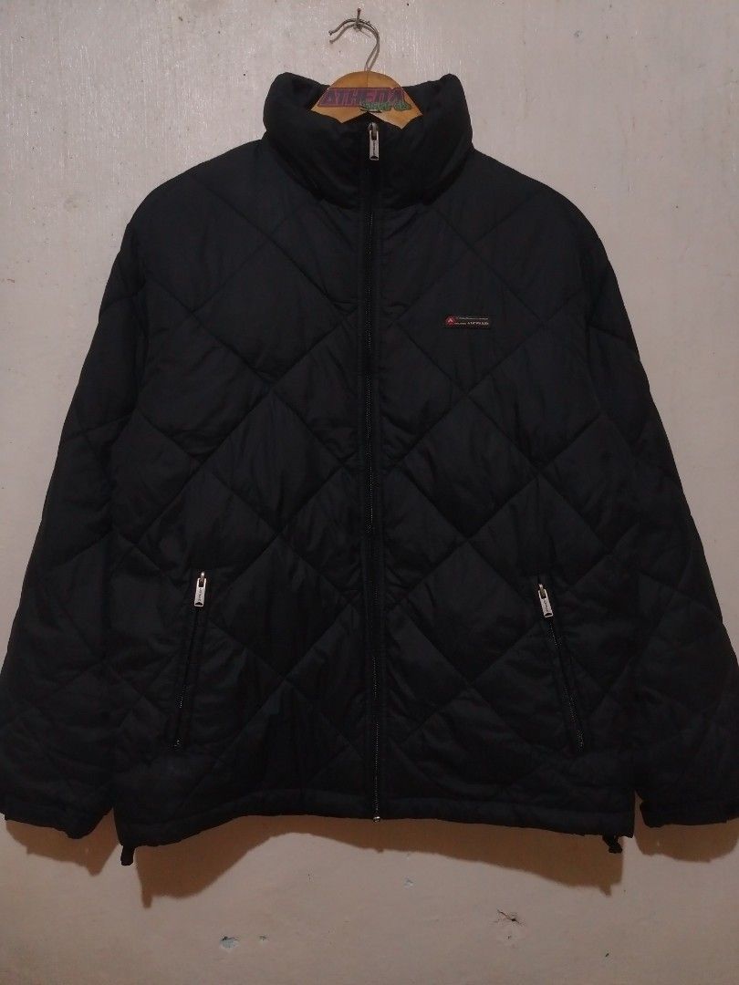Vintage Airwalk Black Quilted Puffer Jacket (Category: Coats, Jackets and Outerwear) located in Rizal. Submitted by gmpastoffi75031 (Listing ID 1469806968, Image 1). Description: - Brand: Airwalk - dimes 23x27.5 - Size: Medium (M) - Color: Classic Black - Design: Stylish diamond quilted pattern with a small logo patch on the left chest - Closure & Collar: Full zip front with a cozy stand collar - Pockets: Two functional zippered lower front pocke