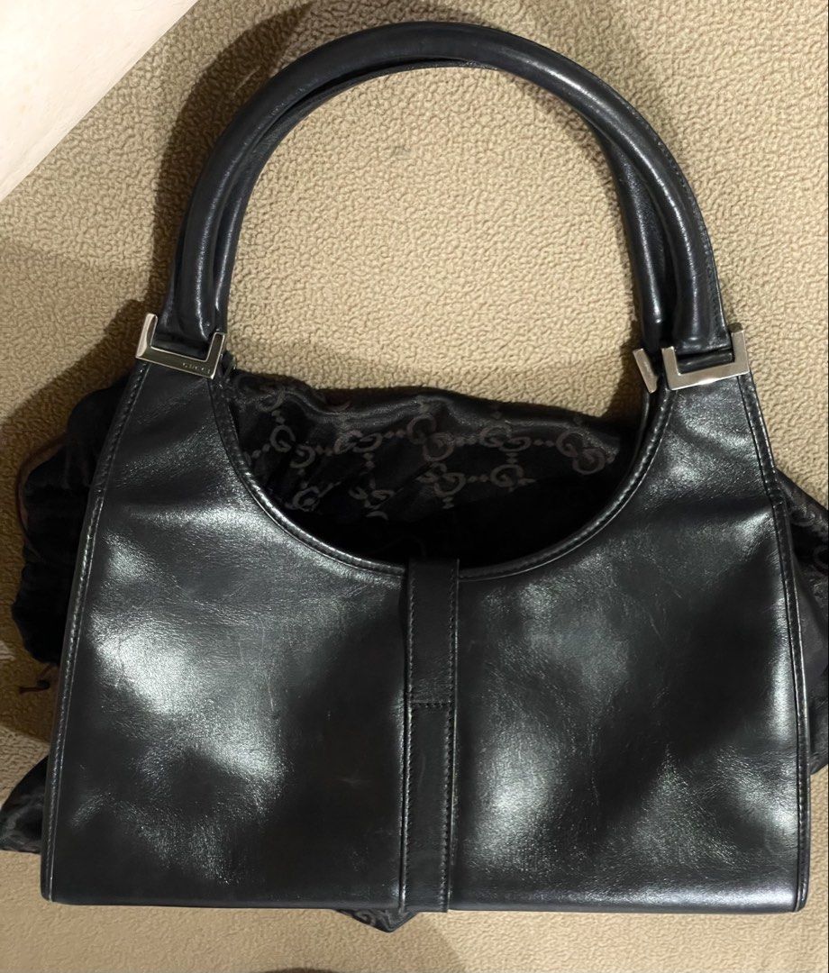 Vintage Gucci Black Leather Bardot Jackie Shoulder Bag (Category: Luxury Bags & Wallets) located in Angeles City. Submitted by rollingwitmary (Listing ID 1467266185, Image 2). Description: Still Negotiable, Just offer. Wag lang po yung super lowballer. :> Purchased from Gucci at Singapore Airport and originally owned by my mom. Comes with its original Gucci dust bag. • Authentic Gucci • Classic and timeless vintage piece • No known issues; all pa