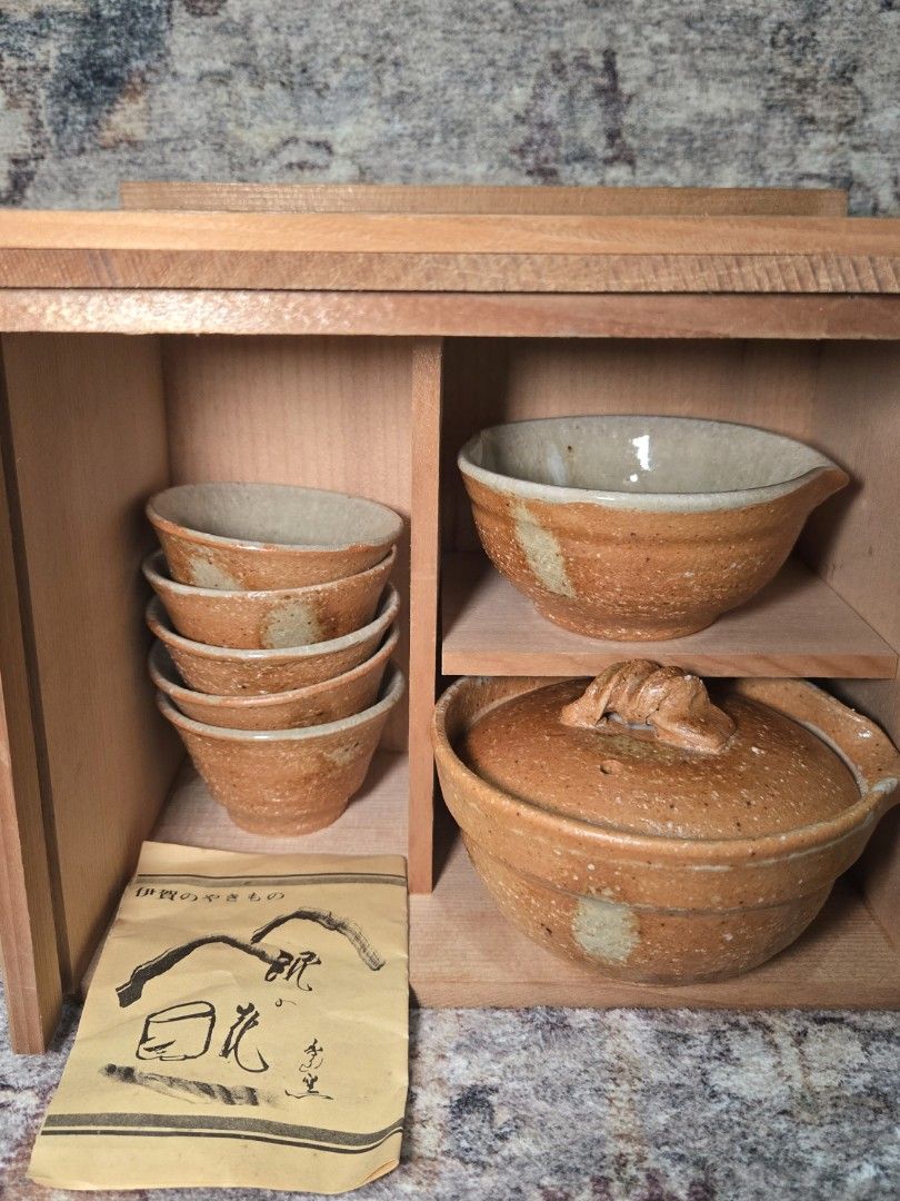 Vintage igayaki matcha / tea set (complete) (Category: Coffee & Tea Tableware) located in Manila. Submitted by cwknds (Listing ID 1469920598, Image 2). Description: a beautifully rustic seven-piece japanese tea set. featuring earthy terracotta tones, soft glazing, and naturally varied finishes that give each piece its own character. complete with five tea cups, two tea vessels, the original wooden presentation box, and leaflet. a lovely find for 