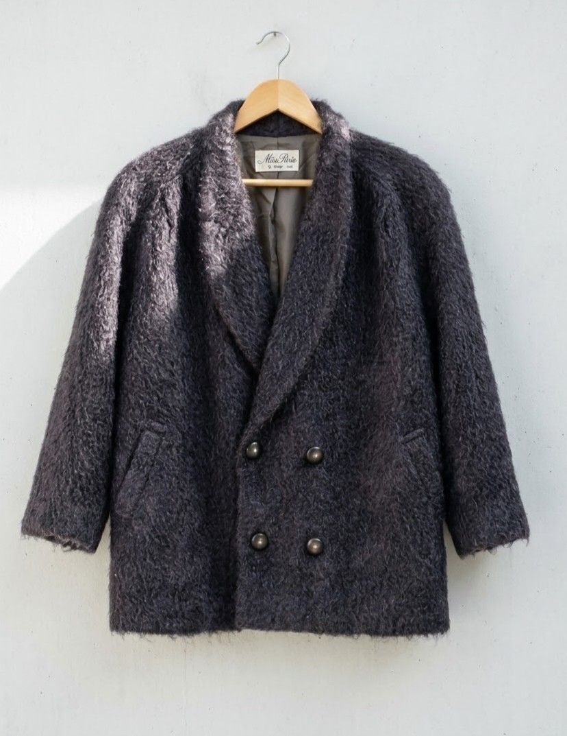 Vintage Miss Paris Double-Breasted Coat (Category: Coats, Jackets and Outerwear) located in Baguio. Submitted by luxeloom099 (Listing ID 1469894486, Image 1). Description: Vintage Miss Paris Double-Breasted Coat ​Classic vintage Miss Paris by Takihyo coat in dark charcoal. Features a soft, fuzzy textured knit, wide shawl lapel, double-breasted button closure, and full interior lining. ​Brand: Miss Paris by Takihyo ​Size: 9AR (Women’s S/M) ​Color: