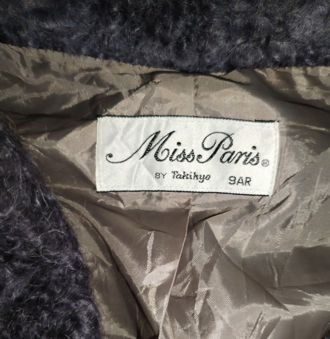 Vintage Miss Paris Double-Breasted Coat (Category: Coats, Jackets and Outerwear) located in Baguio. Submitted by luxeloom099 (Listing ID 1469894486, Image 2). Description: Vintage Miss Paris Double-Breasted Coat ​Classic vintage Miss Paris by Takihyo coat in dark charcoal. Features a soft, fuzzy textured knit, wide shawl lapel, double-breasted button closure, and full interior lining. ​Brand: Miss Paris by Takihyo ​Size: 9AR (Women’s S/M) ​Color: