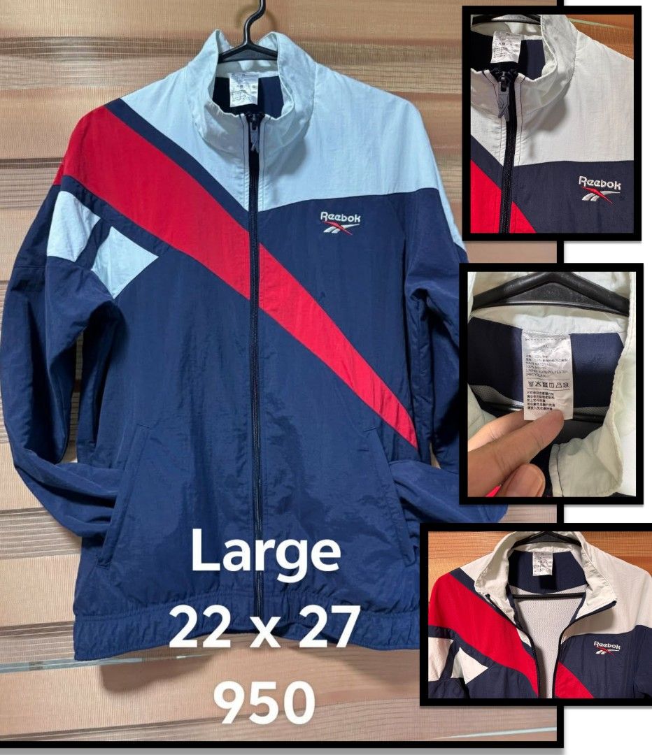 Vintage Reebok Windbreaker Jacket Navy Red White Large (Category: Coats, Jackets and Outerwear) located in Makati City. Submitted by rexb1993 (Listing ID 1469795680, Image 1). Description: - Brand: Reebok - Style: Colorblock windbreaker (Navy Blue/Red/White) - Features: Full zip front, stand collar, mesh lining, embroidered chest logo - Size: Large - Measurements: 22 inches pit to pit, 27 inches length - Condition: Excellent pre-loved condition.