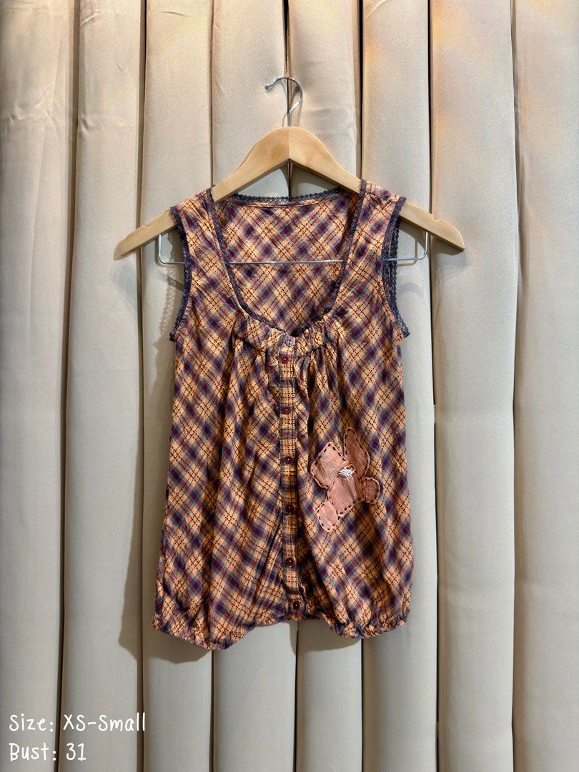 VINTAGE SLEEVELESS PLAID TOP (Category: Sleeveless) located in Manila. Submitted by glamstylemnl (Listing ID 1469916573, Image 1). Description: ♡ SIZE: XS-S ♡ BUST: 31 ♡ Swipe left to see the actual color & details ♡ scoop neckline, button-front placket, gathered front details, small appliquéd patch on the lower left ♡ HQ • 10/10 ♡ Ready to wear 👚.