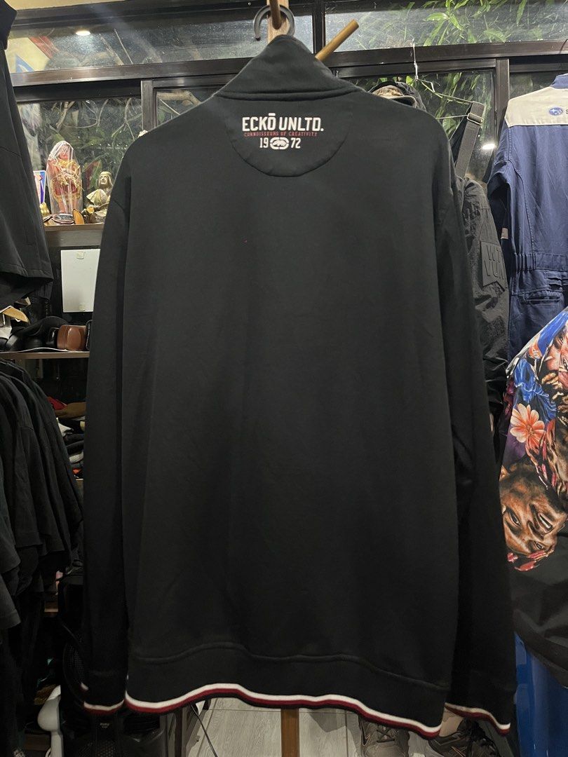 Vintage Y2K Ecko Unlimited Fullzip Track Jacket / Black / Large (Category: Coats, Jackets and Outerwear) located in Camalaniugan. Submitted by anarchymonopoly052128 (Listing ID 1469904241, Image 2). Description: Width: 24.5 Inches Length: 28.5 Inches Issue:Needs Rewash .