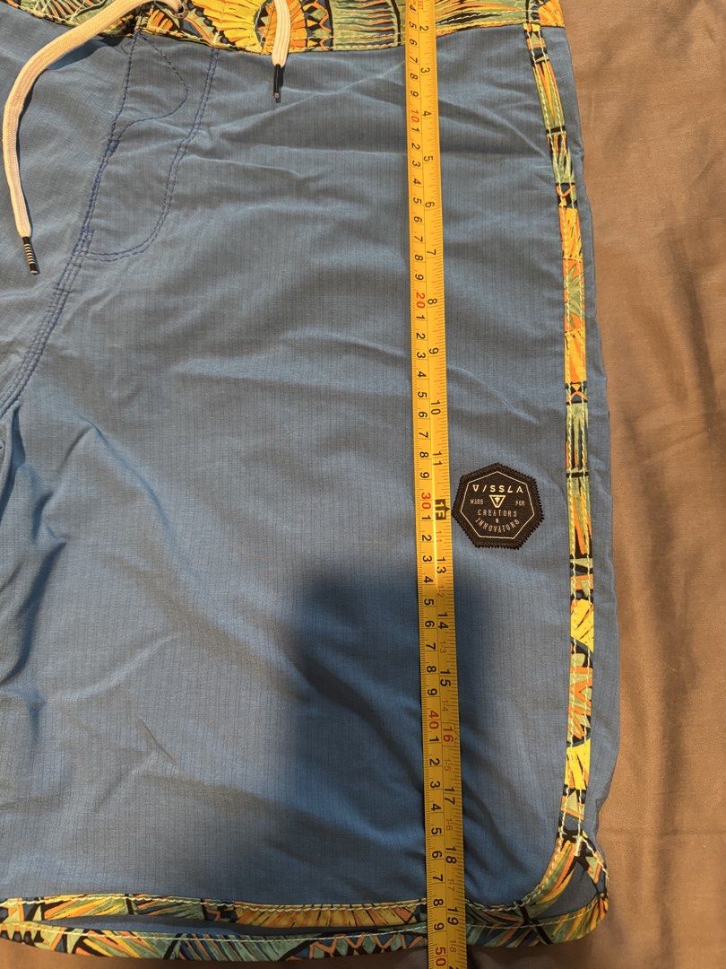 Vissla Upcycled Stretch Board Shorts Blue (Category: Swim Trunks & Board Shorts) located in Taguig. Submitted by dependingonvibe (Listing ID 1469784263, Image 2). Description: - Brand: Vissla (guaranteed authentic) - Color: Blue with tropical leaf trim details on waistband, side piping, and hem - Material: Eco-friendly stretch fabric made from upcycled plastic bottles - Features: Secure lace-up drawstring waist and Vissla logo patch near the lowe