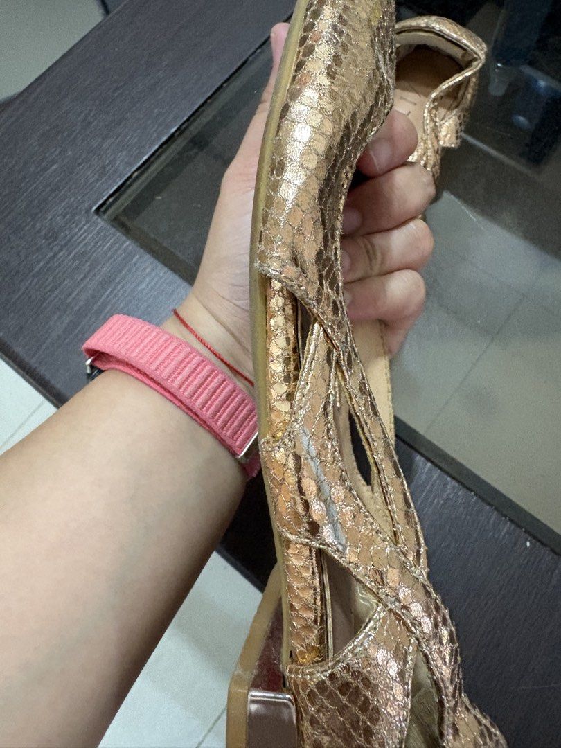 VITA Gold Pointed Toe Flats Size 37 (Category: Flats & Sandals) located in Bacoor. Submitted by grandfire.02c841 (Listing ID 1469880632, Image 3). Description: - Brand: VITA - Size: 37 - Color: Gold metallic with snakeskin texture finish - Design: Pointed toe flats with low block heel and cutout sides - Condition: Light wear on the soles and inner lining creases from previous use.