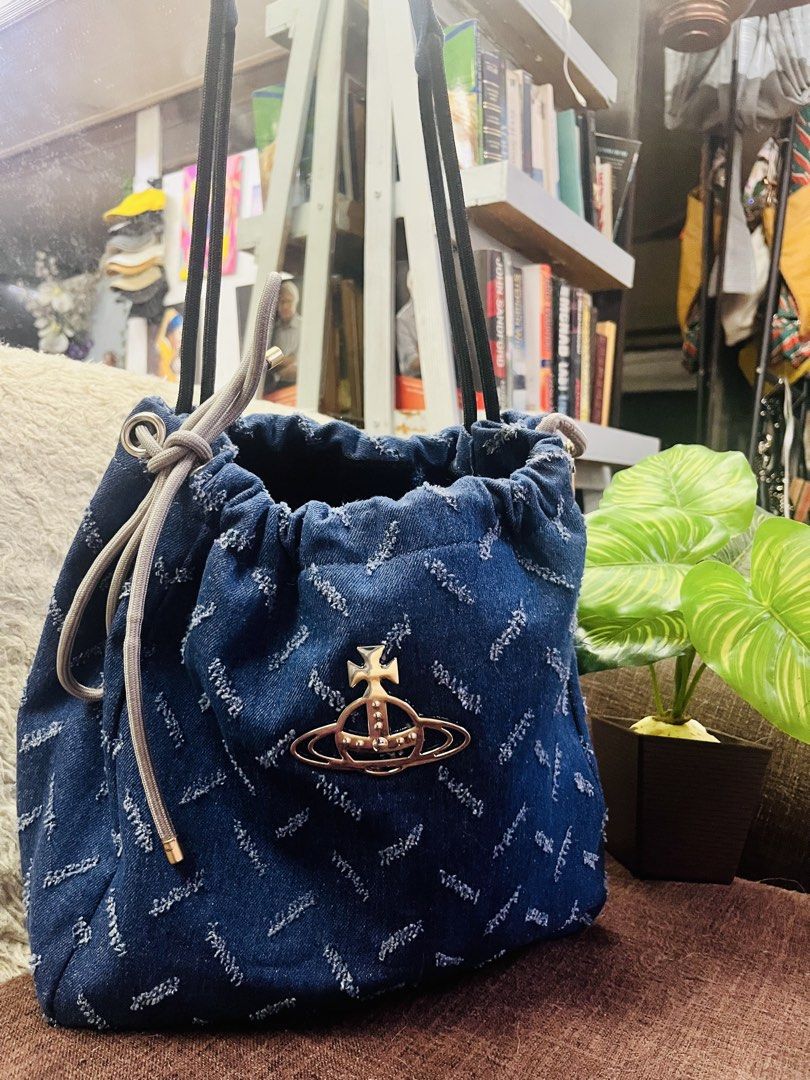 Vivienne Westwood (Category: Cross-body Bags) located in Manila. Submitted by retann (Listing ID 1469759279, Image 1). Description: - Thrifted in hK -Made of denim material large in size -nice trendy addition to anyone’s collection.