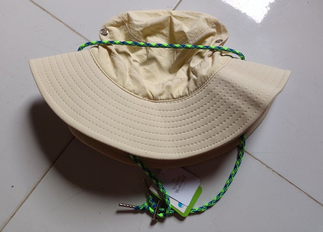 Vivienne westwood bucket hat (Category: Caps & Hats) located in Asingan. Submitted by arnelpalaris8 (Listing ID 1469847225, Image 2). Description: vivienne westwood Bucket Hat small/medium color:Beige water repellent BRANDNEW CONDITION 2K.