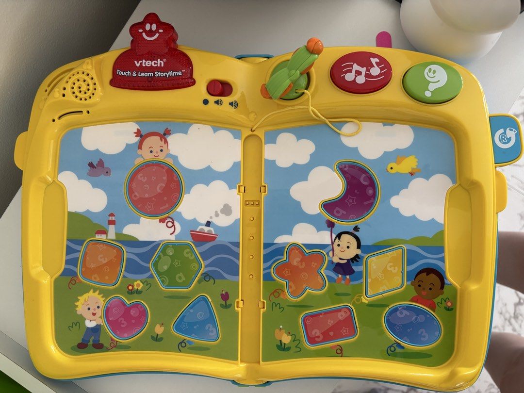 VTech Touch & Learn Storytime (Category: Educational & Learning Toys) located in Quezon City. Submitted by bingbnb (Listing ID 1469774546, Image 1). Description: Rfs: slightly defective - having a hard time recognizing the books / turning of pages Used a few times only VTech Touch & Learn Storytime interactive electronic book for toddlers. Includes multiple story pages like Zoe's Alphabet Adventure, Zoe's Visit to the Farm, Zoe's Musical Adventur
