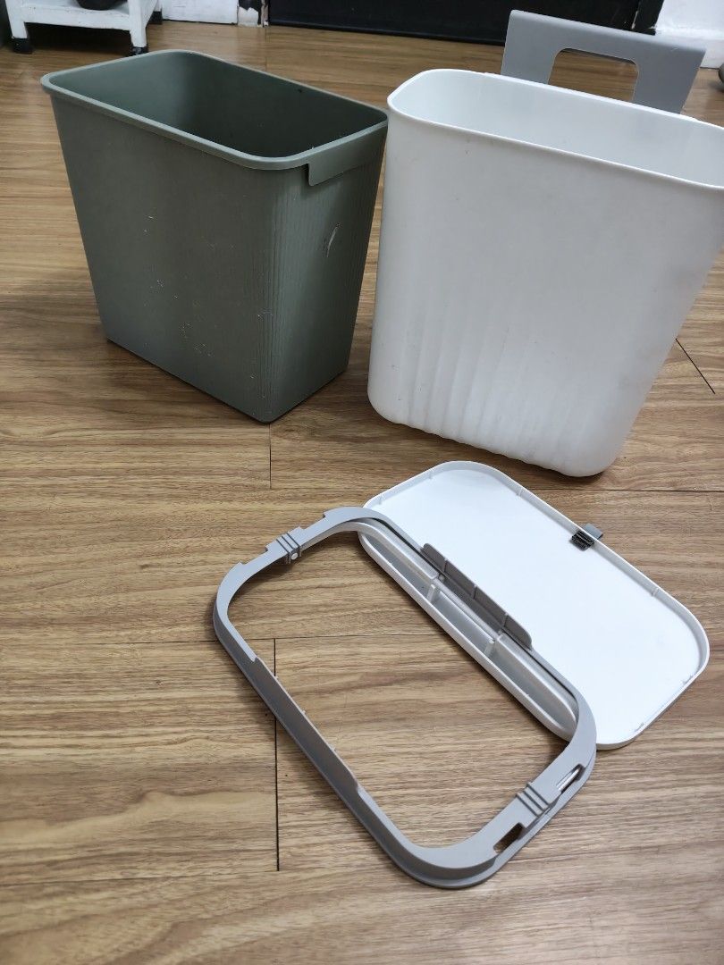 Wall mounted kitchen trash bins with lids (Category: Waste Bins & Bags) located in Mandaluyong City. Submitted by derekalava (Listing ID 1469837894, Image 1). Description: Wall mounted kitchen trash bins with lids Set of 2 compact hanging trash bins (1 White, 1 Dark Green) - Comes with secure lids and hanging brackets - Perfect for kitchen cabinet doors, under sinks, or bathroom walls - Space-saving design makes waste disposal convenient - Easy t