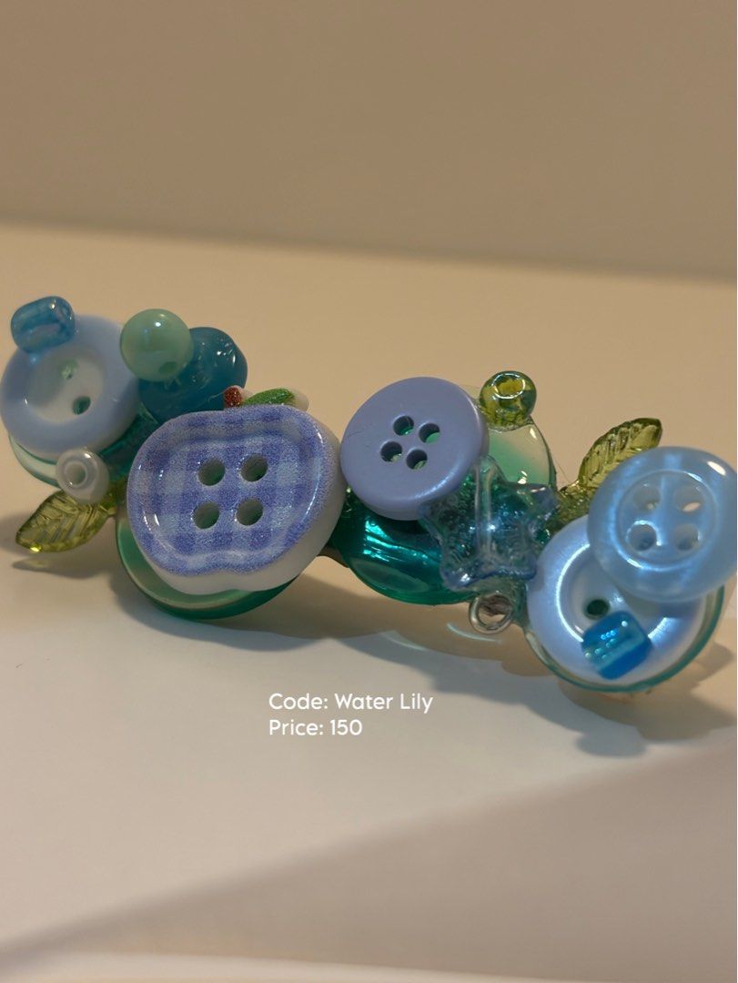 Water Lily Clip (Category: Hair Accessories) located in Makati City. Submitted by oddblings (Listing ID 1469887733, Image 1). Description: ୨୧ ODDBLINGS — Handmade Button Clips ୨୧ ୶ RARELY ORDINARY. Catch us… if you can. ୶ Looking for something cute, unique, and a little out of the ordinary? You’ve found us! ♡ Welcome to Oddblings, a small handmade accessories brand bringing our little creations to life, one button at a time. Every clip is handmad