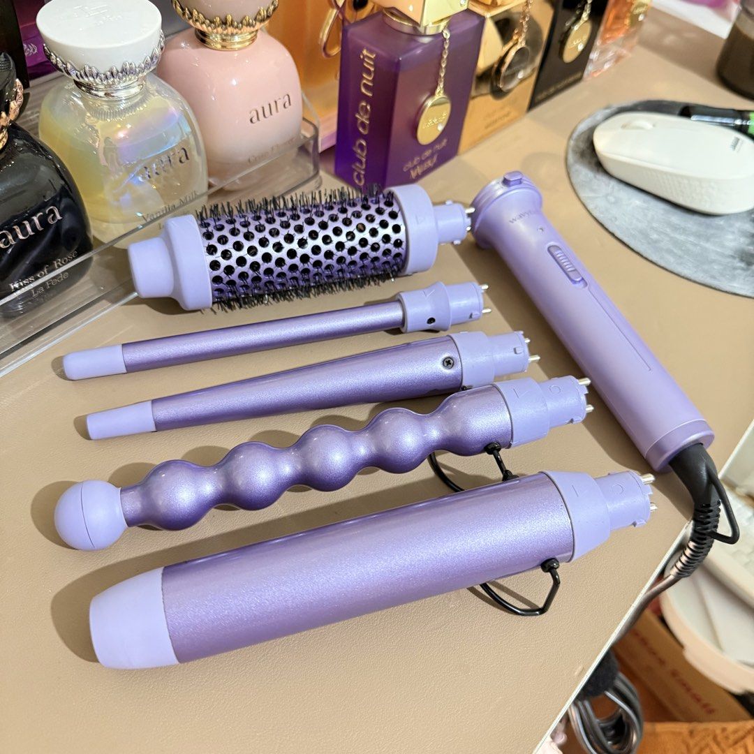 Wavytalk Professional 5 in 1 Curling Wands (Category: Hair) located in Imus. Submitted by gigiandlili.4103 (Listing ID 1469916878, Image 1). Description: - Brand: Wavytalk 5-in-1 Professional Ceramic Curling Wand Set - Yung isang barrel lang used around 1-2 times - The rest unused - Purchased in Amazon.