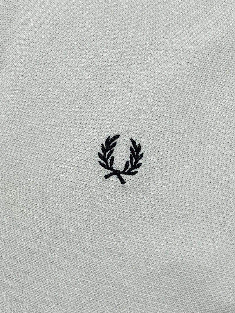 White Fred Perry Polo Shirt (Category: Tshirts & Polo Shirts ) located in Manila. Submitted by tnt_wrldwide (Listing ID 1469934410, Image 2). Description: .