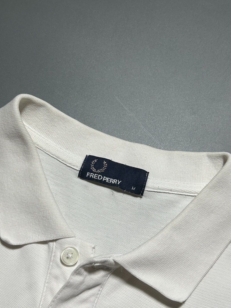 White Fred Perry Polo Shirt (Category: Tshirts & Polo Shirts ) located in Manila. Submitted by tnt_wrldwide (Listing ID 1469934410, Image 3). Description: .