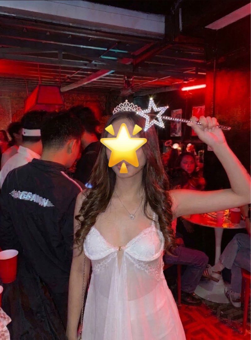 White halloween dress costume (Category: Sets or Coordinates) located in Balanga. Submitted by happymunchkin (Listing ID 1469835859, Image 1). Description: Includes: - white mesh babydoll dress - sparkly rhinestone fishnet stockings - silver rhinestone tiara (new, i lost the old one along with the wand) - magic wand and white shorts not included NOT FOR RENT .