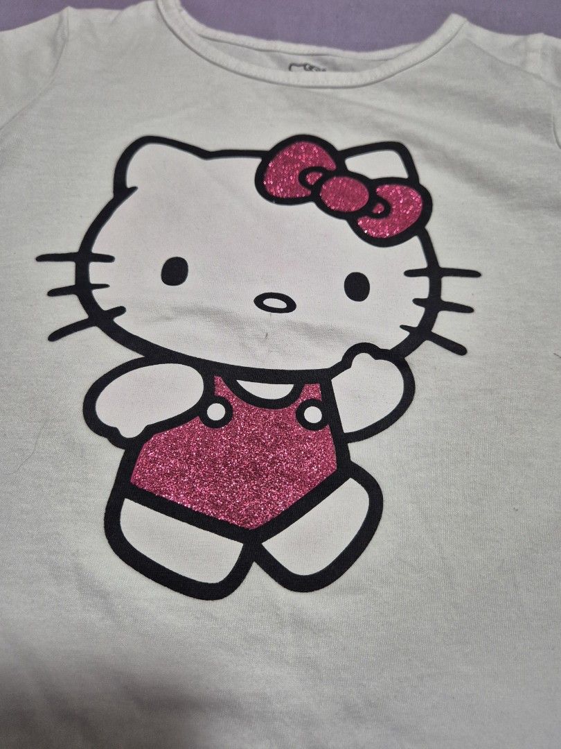 White Hello Kitty Graphic T-Shirt (Category: Babies & Kids Fashion) located in Manila. Submitted by sorayabarr50152 (Listing ID 1469900698, Image 2). Description: Hello Kitty preloved tshirt.