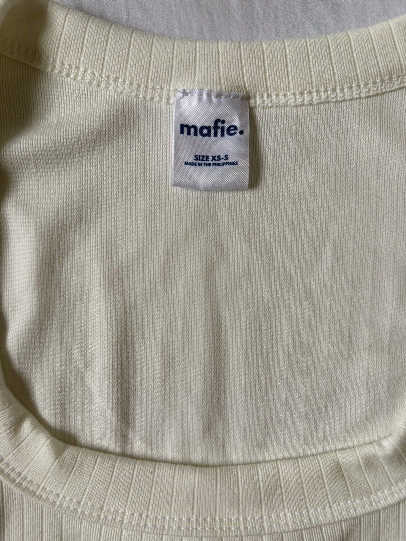 White Ribbed Square Neck Tank Top (Category: Sleeveless) located in Quezon City. Submitted by vidadmarie (Listing ID 1469825627, Image 3). Description: - Brand/Style: Mafie ribbed tank top - Color: Off-white - Size: XS-S (Tag) - Fit & Details: Snug fit, square neckline, thick straps - Never worn.