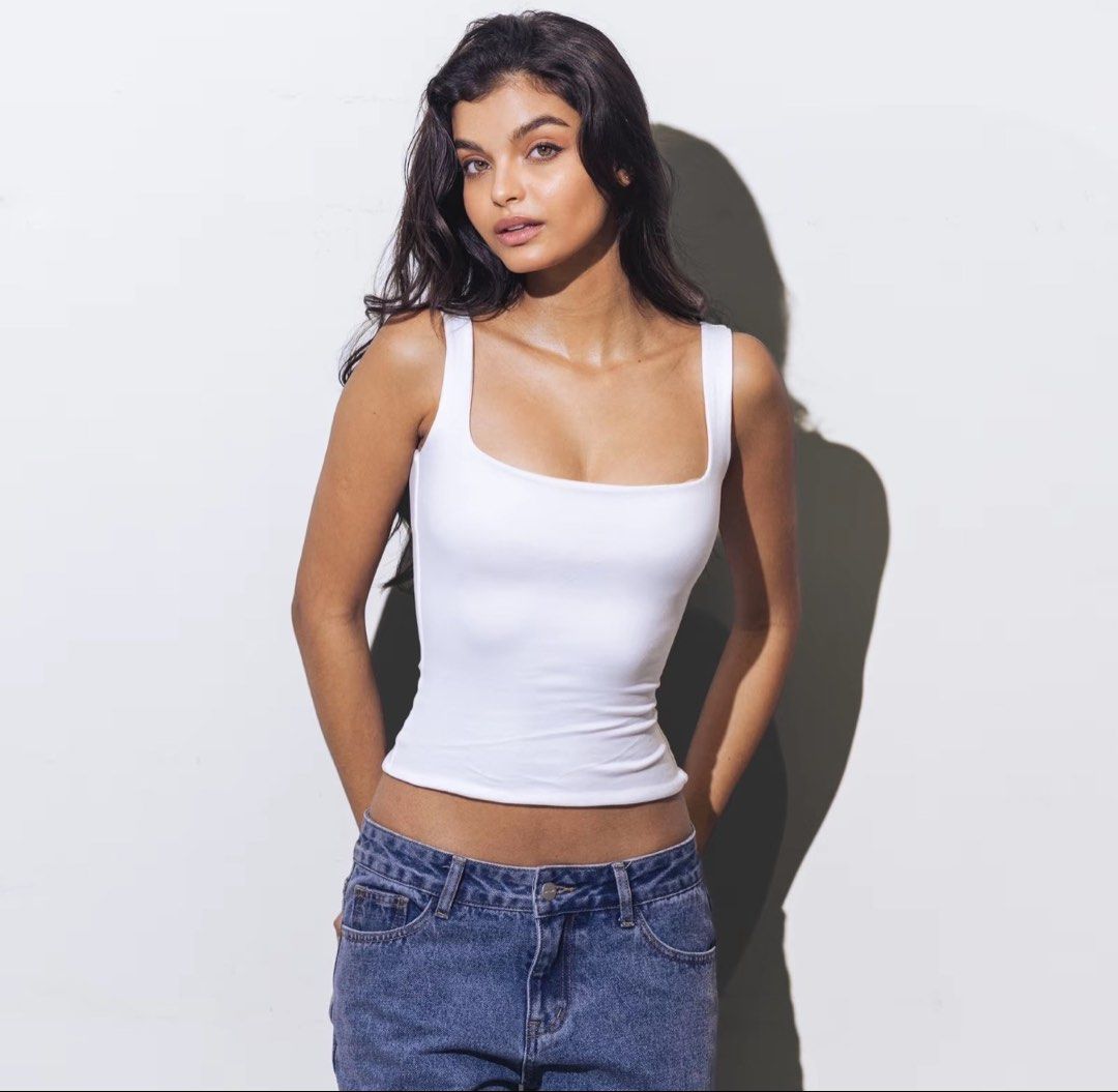White Square Neck Tank Top (Category: Sleeveless) located in Quezon City. Submitted by vidadmarie (Listing ID 1469825652, Image 2). Description: - Brand: MERA - Style: Square neck tank top - Color: White - Size: S - Bust: 30-32” - Waist: 25-27” - Material: Bodycon.