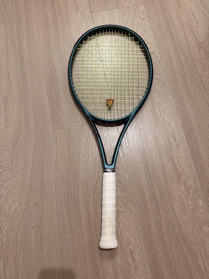 Wilson Blade 100 V9 Tennis Racket (Category: Racket and Ball Sports) located in Santa Rosa. Submitted by katcabanos (Listing ID 1469863963, Image 1). Description: - Model: Wilson Shift 100 V9 - Color: Metallic Teal - Head Size: 100 sq in - Weight: 285g - String Pattern: 16x19 -Grip 2 - Balance: 4 pts head light - Extras: Strung with lime green strings, pizza dampener included, and a fresh white overgrip wrapped on the handle - Sizing: Standard ad