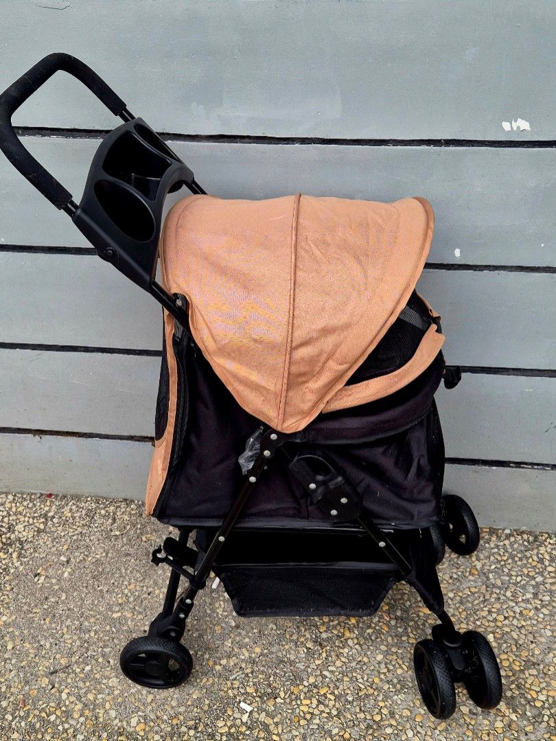 WxT Pet Stroller (SP02XK-B) – Good as New! (Category: Homes & Other Pet Accessories) located in Antipolo. Submitted by saribymonica (Listing ID 1469769946, Image 2). Description: 🐾 WxT Pet Stroller (SP02XK-B) – Good as New! Peach/khaki-colored canopy Black mesh carriage Parent tray with cup holders Under-seat storage basket Purchased from Pet Lovers for ₱4,000 Barely used — only around twice during mall trips Good as new overall, with minor rust