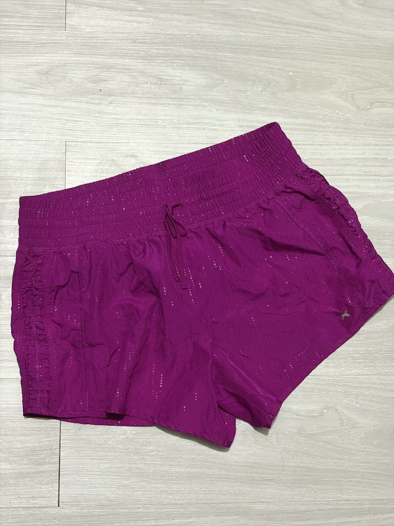 Xersion Performance Wear Purple Athletic Shorts Medium (Category: Activewear) located in Manila. Submitted by happytiger-d966 (Listing ID 1469842930, Image 1). Description: - Brand: Xersion - Size: Medium - Color: Purple with a shiny textured pattern - Comfort & Fit: Wide elastic waistband with matching drawstring and built-in black inner liner shorts - Details: Trendy side ruching on outer seams and a reflective logo on the lower left leg - Idea