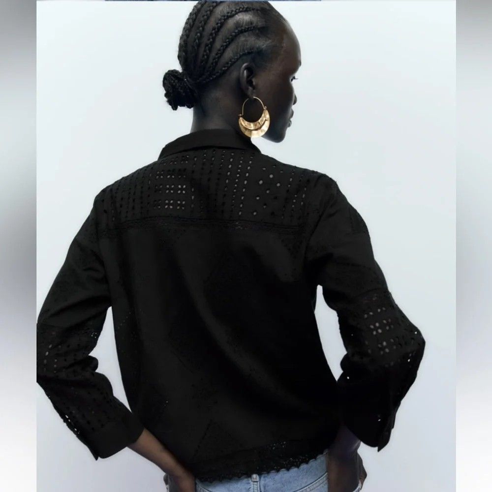XL Zara Black Button Down Eyelet Blouse (Category: Others Tops) located in Castillejos. Submitted by lalainecloset22 (Listing ID 1469788233, Image 2). Description: - Brand: Zara - Style: Long-sleeve button-down blouse with intricate eyelet embroidery details - Color: Classic Black - Size: XL (EUR/USA/MEX) - Condition: Excellent, well-maintained - Features: Breathable fabric, button closure, elegant textured pattern throughout - Perfect for: Casua