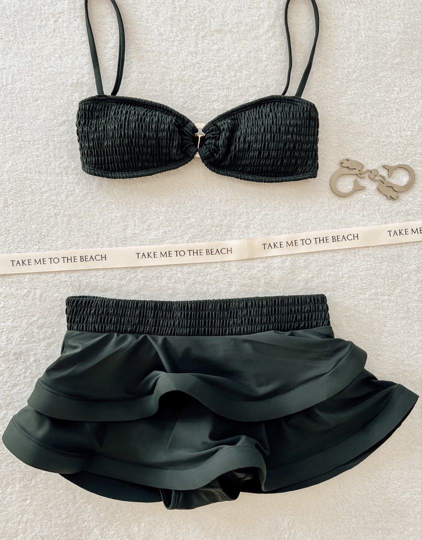 XS - Eighth Mermaid | Helena Set Hunter Green (Category: Bikinis & Swimsuits) located in Las Pinas. Submitted by charmeecharm (Listing ID 1469789692, Image 2). Description: - Brand: Eighth Mermaid - Model: Helena - Color: Hunter Green - Top: Smocked bandeau with thin straps and gold-tone center ring link - Bottom: Ruffled skirt shorts with comfortable elastic waistband - Condition: Like new - Excellent - Perfect for beach trips, pool parties, and