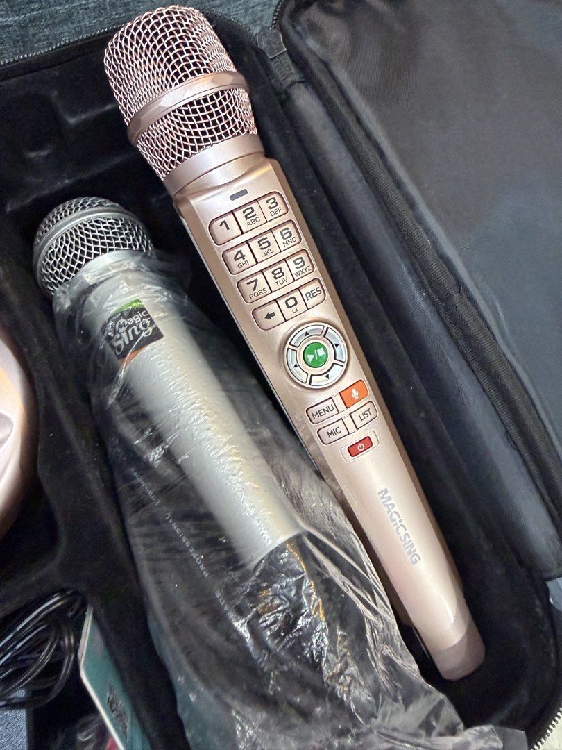 Xtreme Magic Sing Karaoke Microphone Set Rose Gold (Category: Microphones) located in Manila. Submitted by chanelmari19 (Listing ID 1469863968, Image 1). Description: - Includes 2 microphones, base unit, power adapter, and cables - Massive song list booklet with 4,893 songs included - Conveniently stored in a sturdy zipped carrying case - Ideal for home singing sessions, family bonding, and parties.