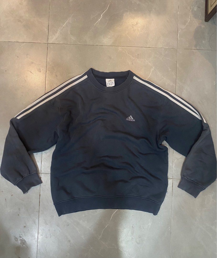 Y2K adidas three stripes crewneck (Category: Coats, Jackets and Outerwear) located in Cainta. Submitted by ccrue (Listing ID 1469626589, Image 1). Description: Adidas 2000s Three Stripe Crewneck Sweatshirt Dark Ash gray colorway Color rate: 8/10 24x26 Boxy Fit Issue: cuffs, minimal fading, neckline and small scratch sa likod (see pics) Good Condition Php 499 +Sf Cainta Location.