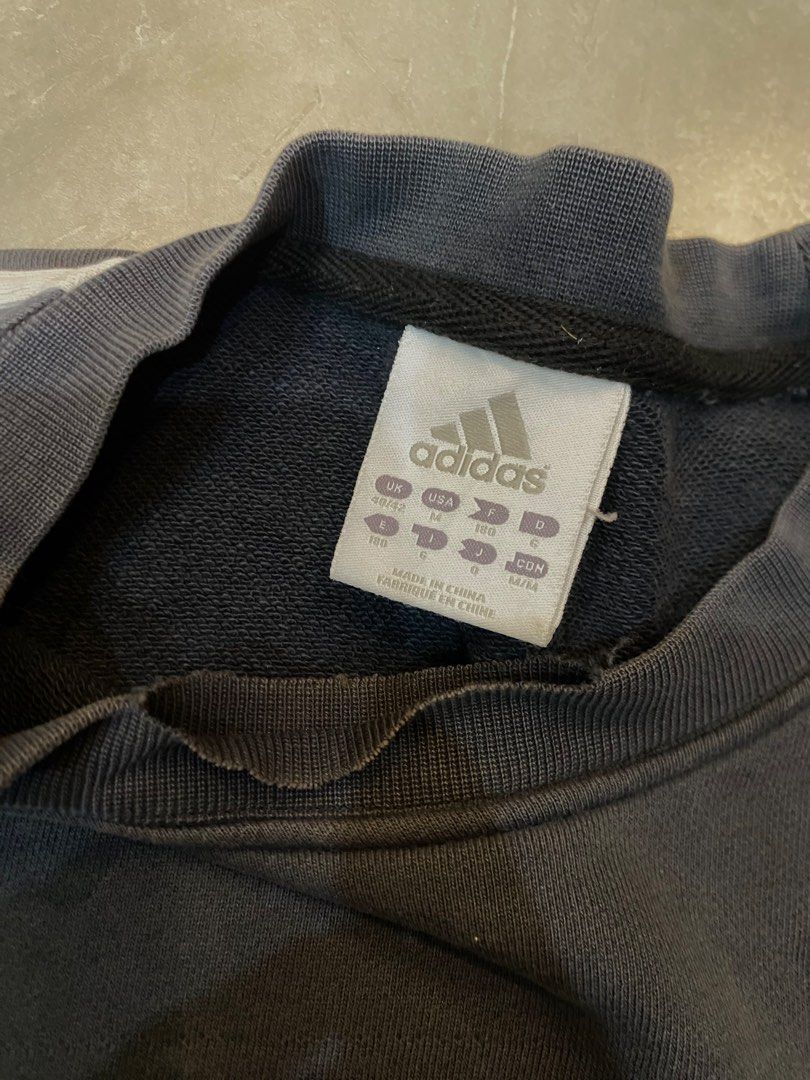 Y2K adidas three stripes crewneck (Category: Coats, Jackets and Outerwear) located in Cainta. Submitted by ccrue (Listing ID 1469626589, Image 3). Description: Adidas 2000s Three Stripe Crewneck Sweatshirt Dark Ash gray colorway Color rate: 8/10 24x26 Boxy Fit Issue: cuffs, minimal fading, neckline and small scratch sa likod (see pics) Good Condition Php 499 +Sf Cainta Location.