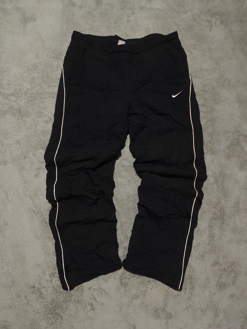 Y2K Nike Track pants (Category: Joggers) located in Dagupan City. Submitted by johnny.flips (Listing ID 1469891662, Image 2). Description: free waist with lace up to 36W 38L Minimal burn pinholes.