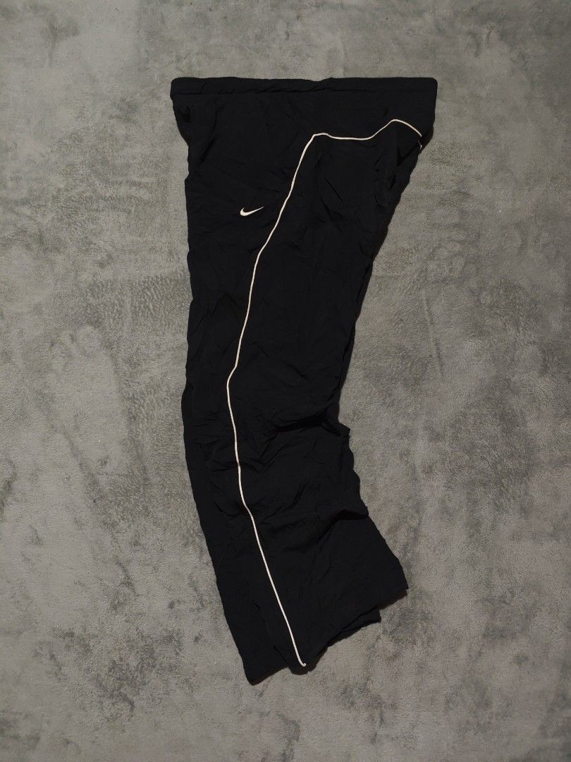 Y2K Nike Track pants (Category: Joggers) located in Dagupan City. Submitted by johnny.flips (Listing ID 1469891662, Image 1). Description: free waist with lace up to 36W 38L Minimal burn pinholes.