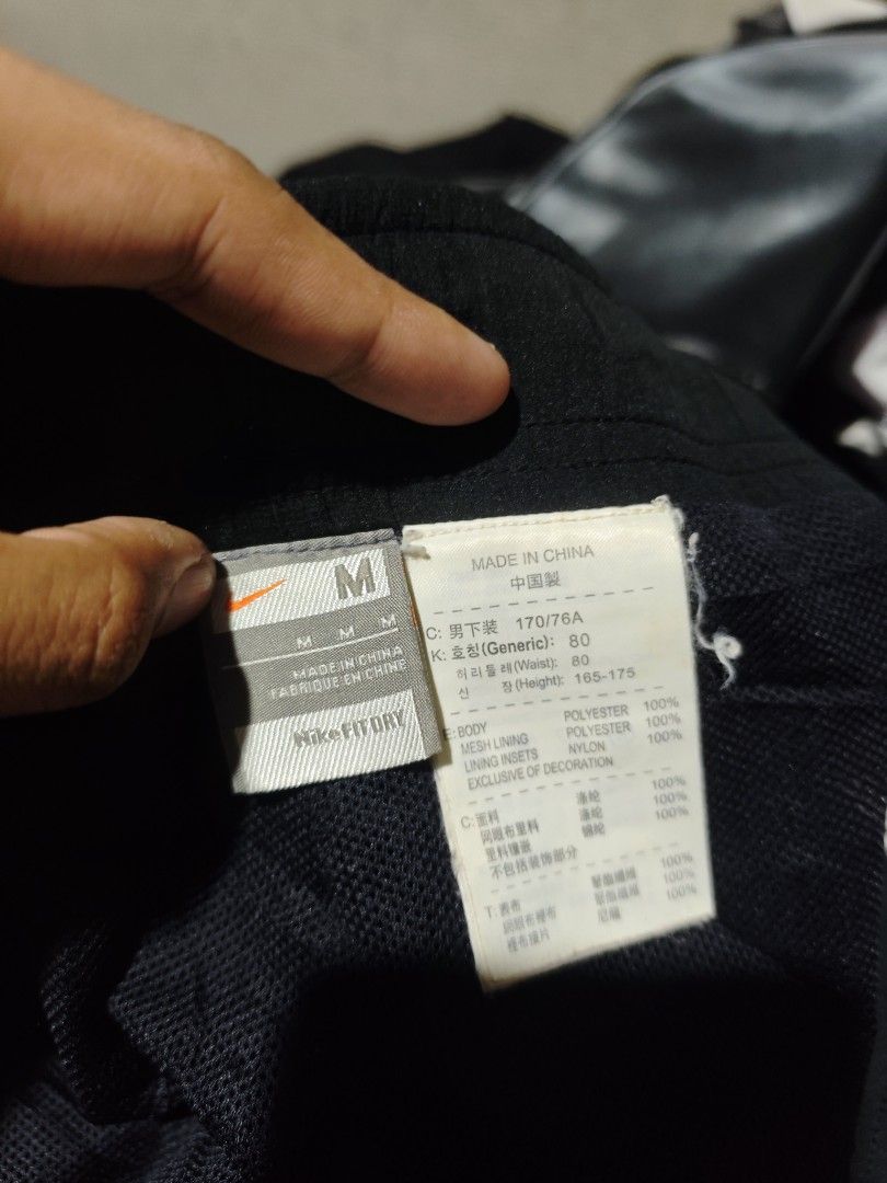 Y2K Nike Track pants (Category: Joggers) located in Dagupan City. Submitted by johnny.flips (Listing ID 1469891662, Image 3). Description: free waist with lace up to 36W 38L Minimal burn pinholes.