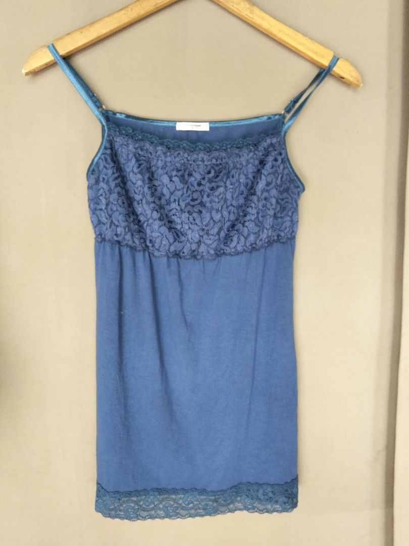 Y2k top Comfort Basic Blue Lace Camisole Size M (Category: Sleeveless) located in Bulacan. Submitted by glessantil41386 (Listing ID 1469776922, Image 1). Description: - Brand: Comfort Basic - Size: M - Color: Blue - Material: 60% polyester, 35% rayon, 5% polyurethane - Features: Floral lace chest panel, bottom lace trim, and adjustable thin shoulder straps - Condition: Great for everyday layering and comfortable wear.