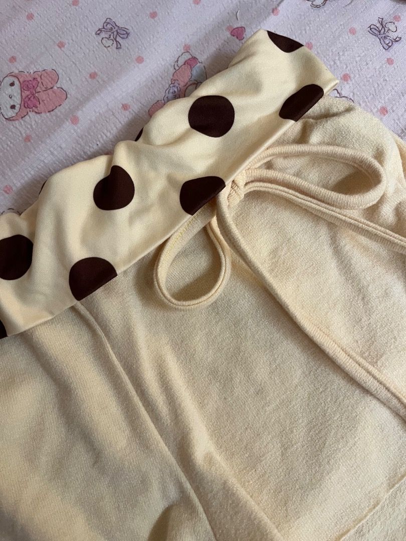 Yellow Polka Dot Fold-Over Lounge Shorts (Category: Shorts) located in Caloocan City. Submitted by zaviscool (Listing ID 1469874058, Image 2). Description: - Color: Light yellow with dark brown polka dots on the waistband - Material: Soft and comfortable fabric - Fit: Adjustable front tie string for a custom fit - Style: Folded waistband detail - Best for: Sleepwear, lounging, or casual days at home - Easy pairing: Matches great with any simple t