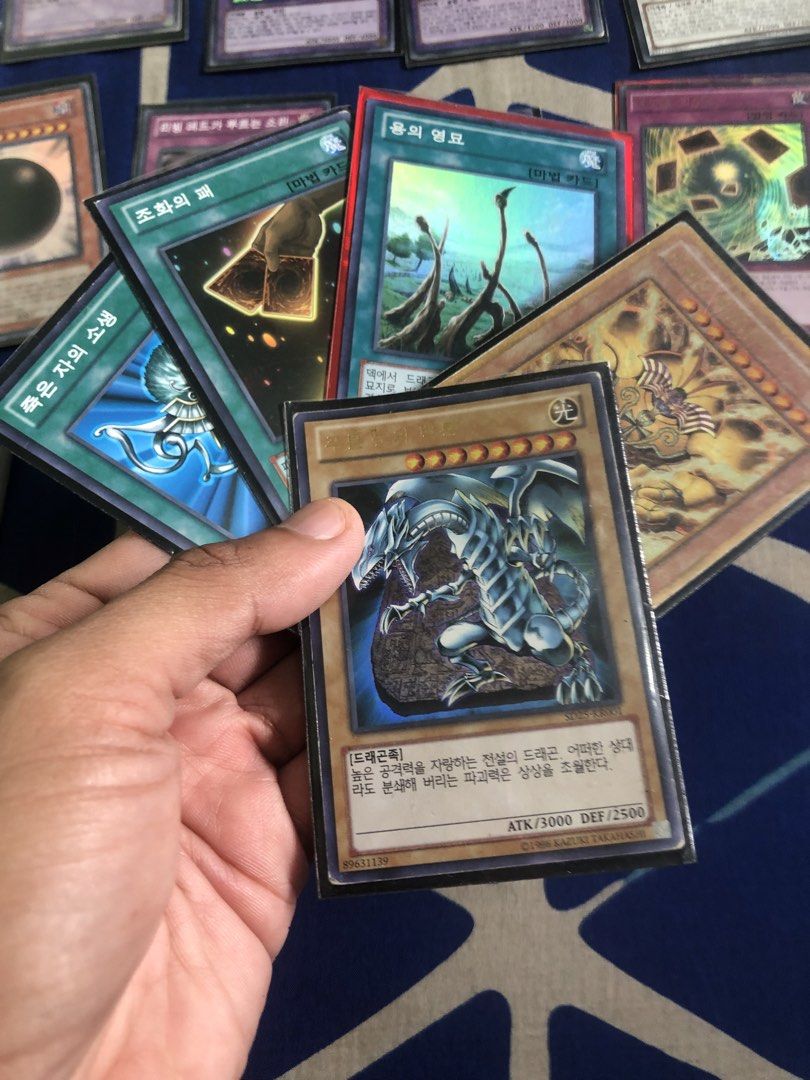 YugiOh korean 80pcs lot set bundle (Category: Card Packs) located in Quezon City. Submitted by markgolveo (Listing ID 1469782905, Image 2). Description: YugiOh korean 80pcs lot set bundle 80 pcs in total 22pcs shiny cards with sleeve cover 58 pcs non shiny Cards has visible signs of usage Some cards has signs of heavy wears.