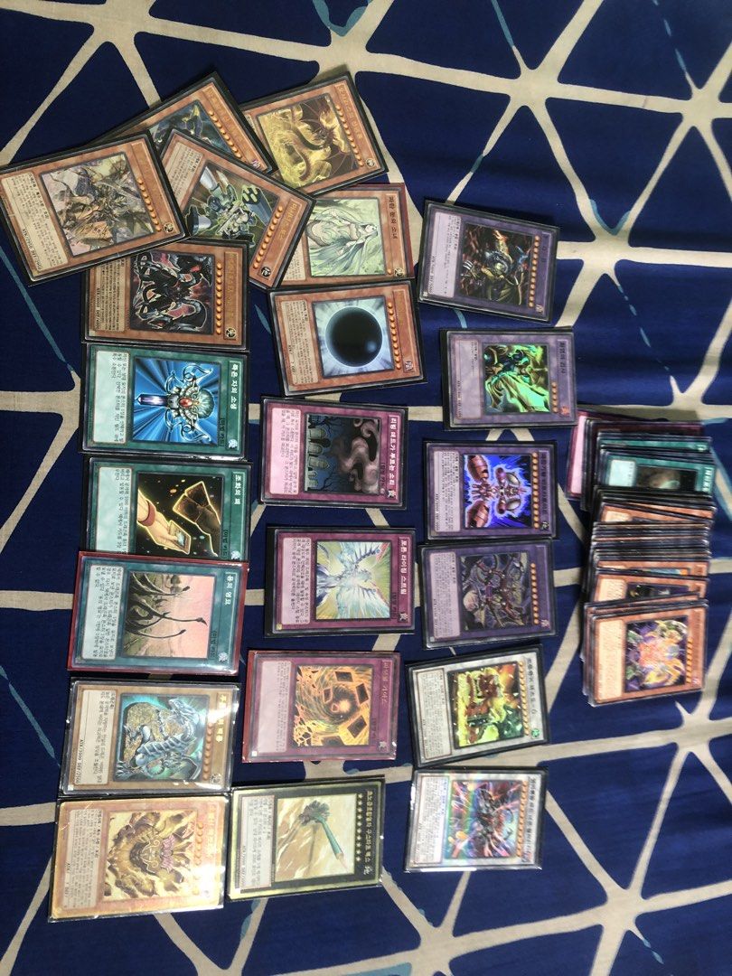 YugiOh korean 80pcs lot set bundle (Category: Card Packs) located in Quezon City. Submitted by markgolveo (Listing ID 1469782905, Image 1). Description: YugiOh korean 80pcs lot set bundle 80 pcs in total 22pcs shiny cards with sleeve cover 58 pcs non shiny Cards has visible signs of usage Some cards has signs of heavy wears.
