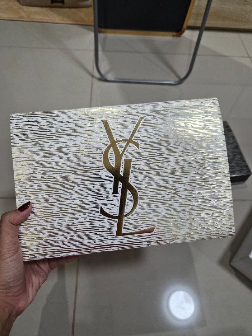 YSL Empty Gift Boxes Packaging (Category: Everything Else Others) located in Paranaque City. Submitted by lovelife.312 (Listing ID 1469797021, Image 1). Description: ***PLEASE READ CAREFULLY*** - Price stated is per piece - 1 White box - 500 php - 1 Black box - 500 php - Authentic YSL empty gift box sets (Original packaging) - Includes 2 distinct designs: White & gold textured set and Black & silver set - Comes complete with matching outer sleeve