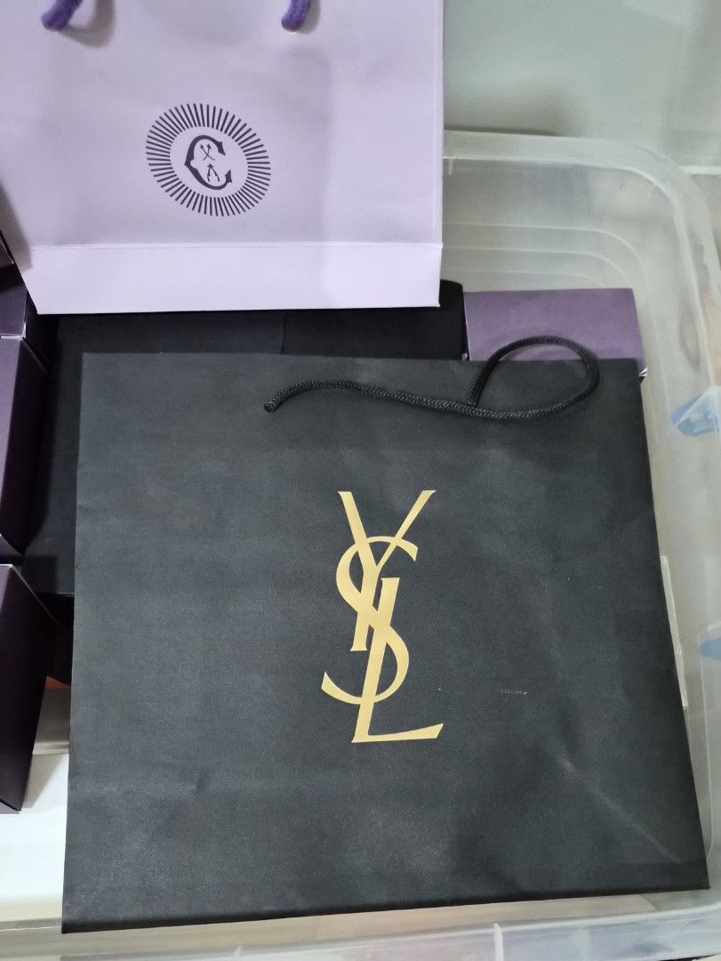 YSL Paper Bag (Category: Everything Else Others) located in Paranaque City. Submitted by lovelife.312 (Listing ID 1469798657, Image 2). Description: ***PLEASE READ CAREFULLY*** - 1 pc. Authentic Yves Saint Laurent (YSL) paper bag - Ideal for gifting, organizing, or collection MAILING AND DELIVERY: - Meet up only SM City Sucat, Uptown Mall BGC and Ayala Malls by the Bay. - After lunch time 1pm onward. - If you prefer delivery, buyer will book cour