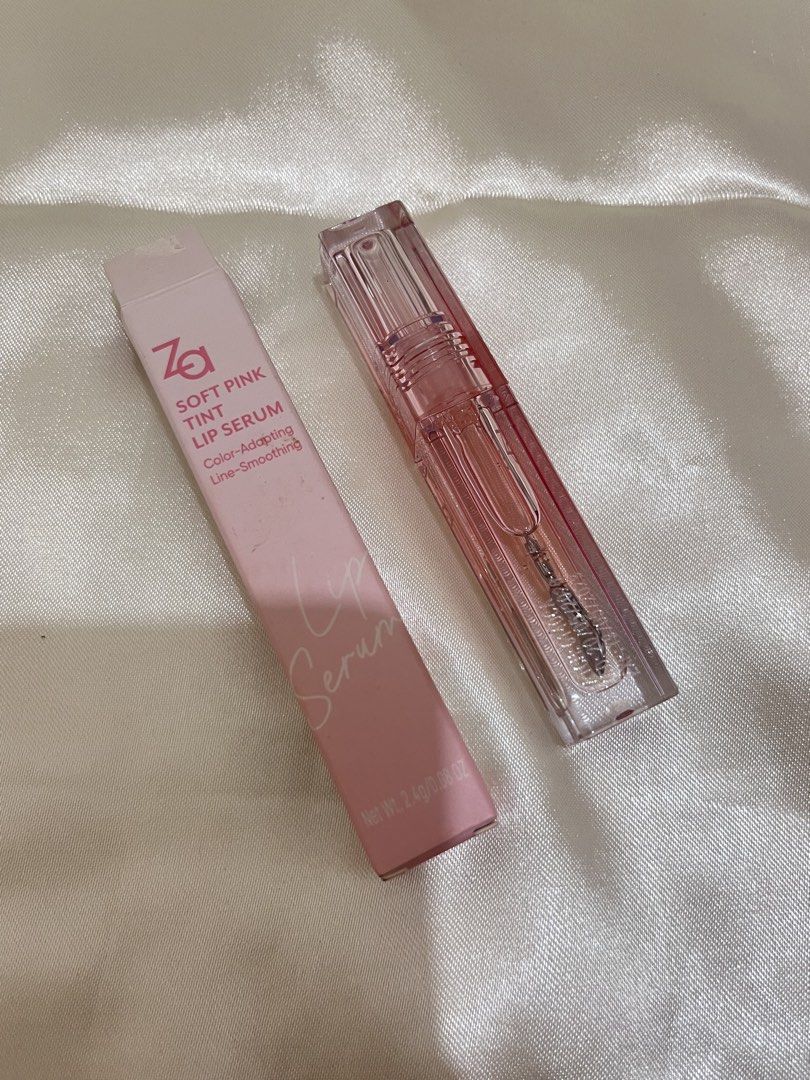 Za Soft Pink Tint Lip Serum (Category: Makeup) located in Caloocan City. Submitted by brdnkm26 (Listing ID 1469785339, Image 3). Description: - Brand: Za - Product: Soft Pink Tint Lip Serum - Size: Net weight 2.4g / 0.08 oz - Formula: Color-adapting & line-smoothing - Packaging: Clear pink tube with metal applicator wand - Inclusion: Original box included - Condition: Barely used, tested once only.