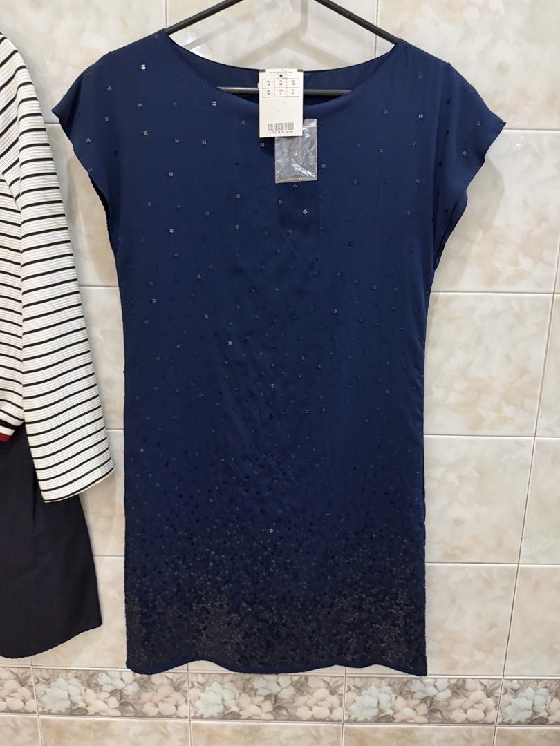 Zara and Promod Dresses Bundle (Category: Dresses) located in Manila. Submitted by jcmph (Listing ID 1469777956, Image 2). Description: Two dresses included in this bundle. First one is a Zara Basic combo dress with a striped knit top section and dark navy skirt bottom, size XS. Second one is a Promod navy blue dress with subtle pattern details, cap sleeves, size 34 / UK 6, brand new with tags still attached. Both pieces ready for a new home. Bot
