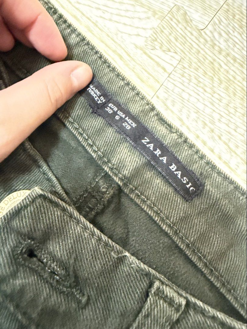 Zara Basic Olive Green Pants (Category: Jeans) located in Quezon City. Submitted by marifavo (Listing ID 1469819338, Image 2). Description: - Brand: Zara Basic - Color: Olive Green - Size: EUR 38, USA 6, MEX 28 - Origin: Made in Turkey - Design: Classic five-pocket styling with button closure and trendy zippered ankles - Fit: Comfortable and versatile everyday staple.