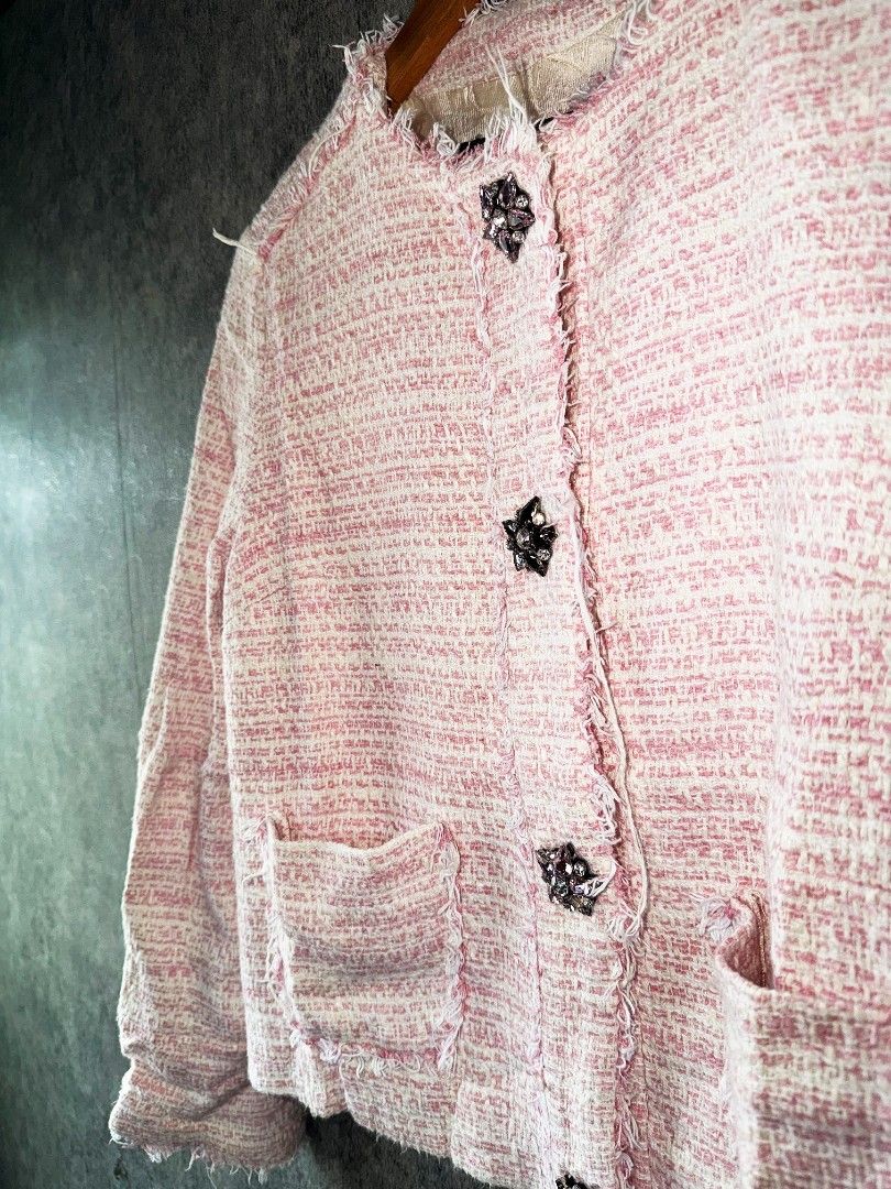 Zara Basic Pink Tweed Jacket Size S (Category: Coats, Jackets and Outerwear) located in Quezon City. Submitted by lexthrift (Listing ID 1469937700, Image 3). Description: - Brand: Zara Basic - Size: S (Made in Morocco) - Color: Pink and white tweed - Style: Short, cropped fit - Details: Distressed frayed edges along neckline, placket, pockets, and hem - Closure: Front button closure with sparkly jewel buttons - Pockets: Two front patch pockets - 