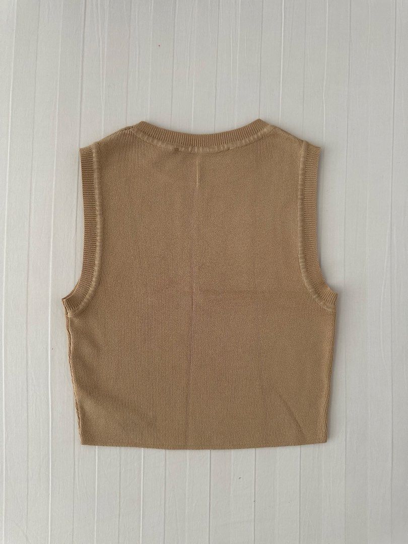 Zara Beige Knit Tank Top Size S (Category: Sleeveless) located in Manila. Submitted by denise805 (Listing ID 1469886607, Image 2). Description: - Brand: Zara - Style: Sleeveless ribbed knit tank top with crew neckline - Color: Beige - Size: S (EUR S, USA S, MEX 26) - Material: Comfortable fabric with good stretch - Condition: Clean and ready to wear - Made in: Bangladesh.