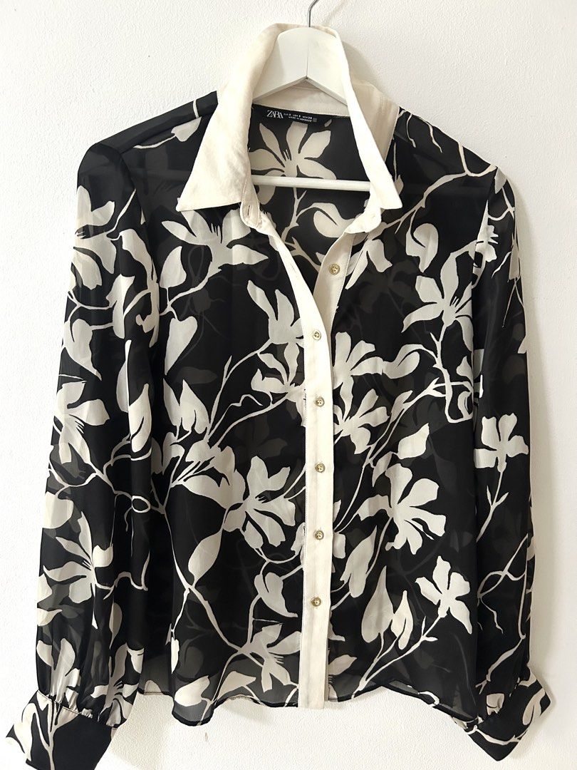 Zara Black and White Floral Chiffon Blouse (Category: Blouses) located in Manila. Submitted by isabelle_1104 (Listing ID 1469943349, Image 1). Description: Semi Sheer. Condition 10/10.
