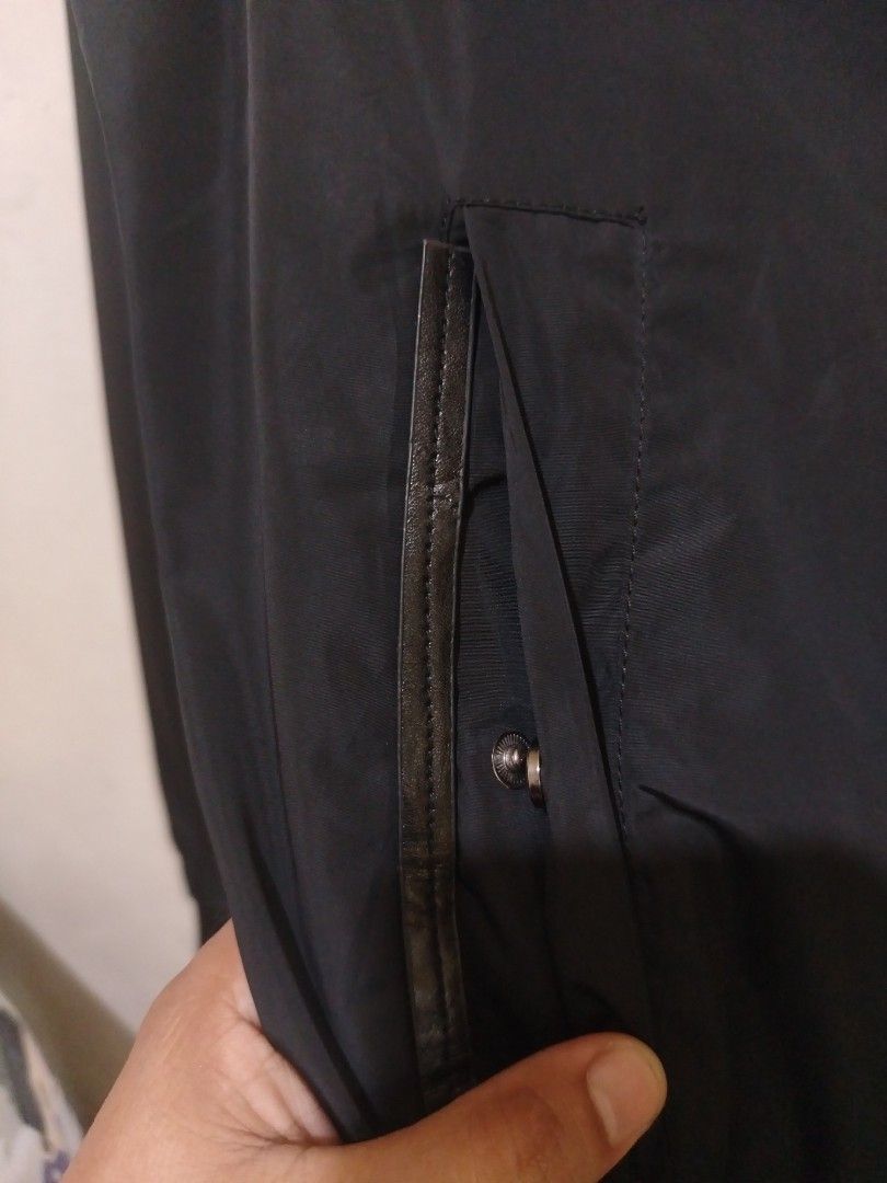Zara Black Bomber Jacket (Category: Coats, Jackets and Outerwear) located in Rizal. Submitted by gmpastoffi75031 (Listing ID 1469800402, Image 2). Description: - Brand: Zara - dimes 22.5x26 - Color: Black - Size: M - Closure: Front zip - Details: Ribbed collar and cuffs, mesh lining - Pockets: Two side pockets with snap buttons, sleeve utility pocket with zipper - Origin: Made in China.