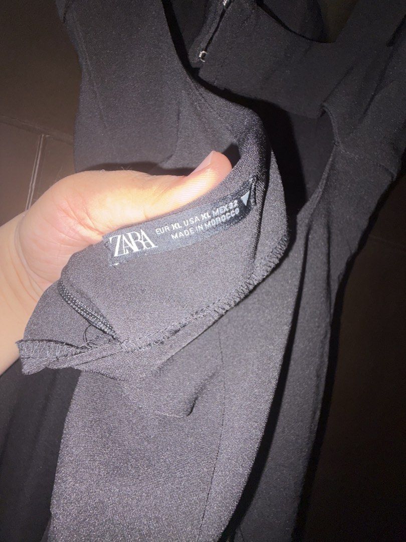 Zara Black Cut-out Jumpsuit Size XL (Category: Jumpsuits) located in Manila. Submitted by viadinamama143 (Listing ID 1469811413, Image 3). Description: NEVER USED!! Just tags removed - Brand: Zara - Size: XL - Color: Solid Black - Origin: Made in Morocco - Design: Square neckline & wide leg silhouette - Details: Back cut-out with hook-and-eye closure and back zip fastening - Perfect for: Night outs and statement looks Original!! Bought from Canad