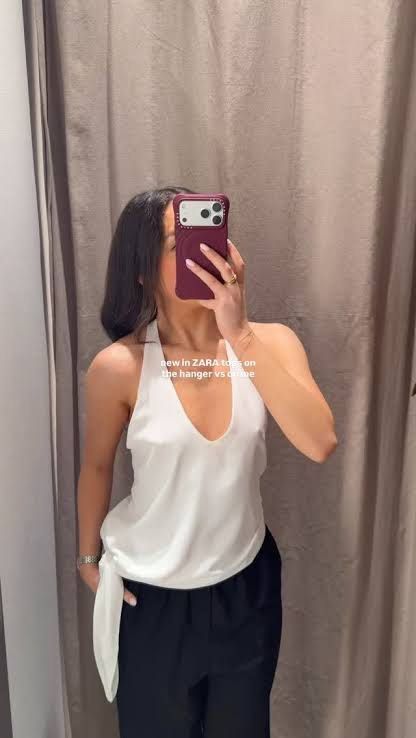Zara Black Tie Halter (Category: Sleeveless) located in Quezon City. Submitted by hanas.declutter (Listing ID 1469807489, Image 2). Description: - Black Backless Top - When worn photos are from the Zara site (white version was posted to show fit).